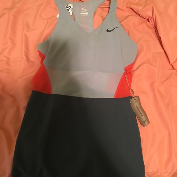 Nike work out shirt(has a small spot on the back)