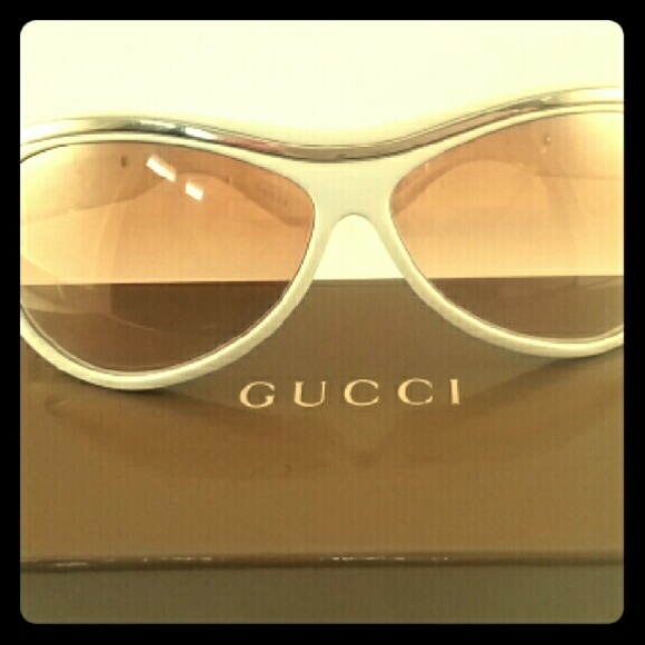 Authentic white and Gold Gucci Sunglasses Reserved