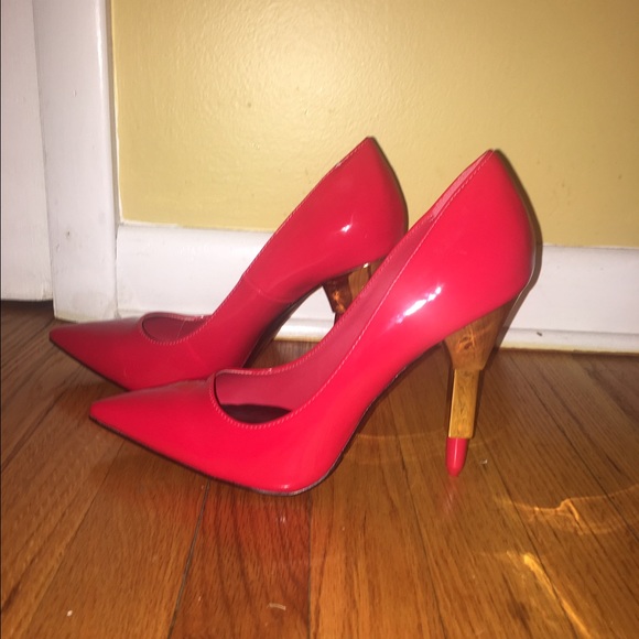 Red faux patent pumps NWOT