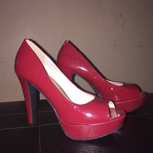 Red peep toe pumps