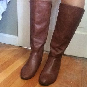 Leather tall brown boots.