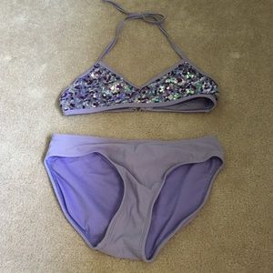 Purple sequined swimsuit