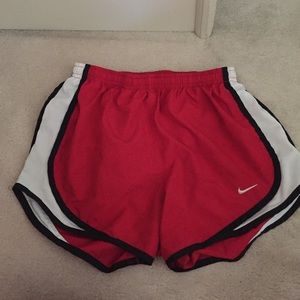 Red Nike shorts