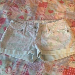 Floral shorts that are cuffed
