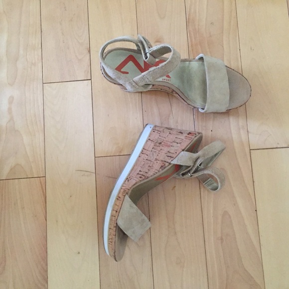 AK tan wedge sandals.