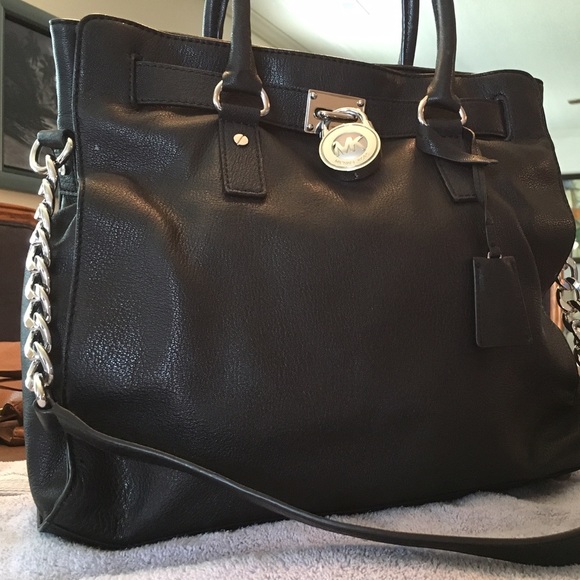Authentic Michael Kors black handbag.