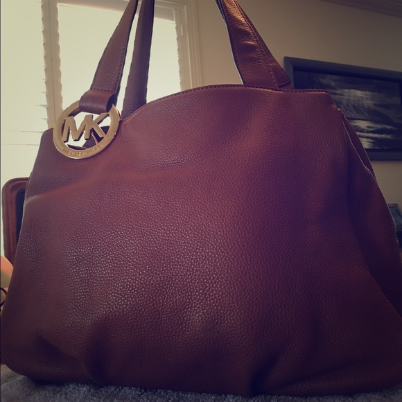 Authentic Michael Kors camel handbag.