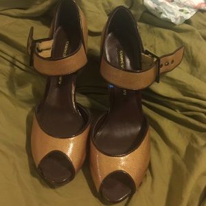 Tan peep toe shoe