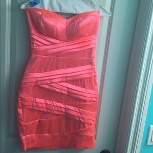 Strapless, short, bright coral homecoming dress