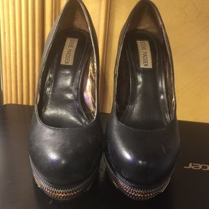 Worn Steve Madden black leather heels