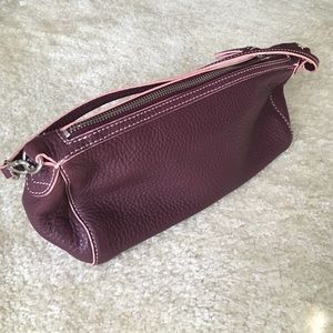 Small, plum colored leather Cole Haan shoulder bag