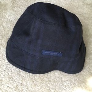 Burberry hat in dark blue plaid. Like new