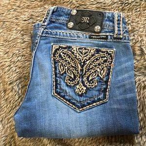 Hardly worn Miss Me Jeans missing a stud ????