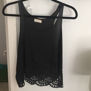 Black blouse with cut pattern