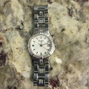 Small faced silver and diamond bulova watch