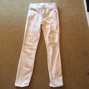 White slim straight mid rise ankle jeans