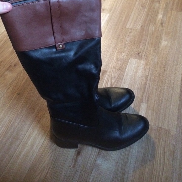 Brown and black knee high boots
