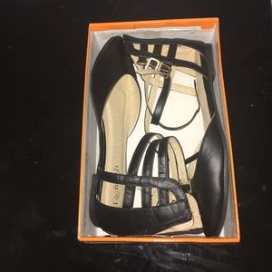 Black with gold detail flats, never worn.