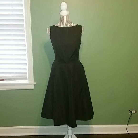IT HAS POCKETS ;) Black fit and flare dress.