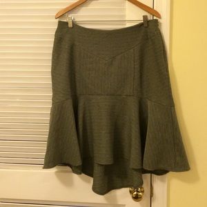 Adorable grey striped skirt. Longer in the back.