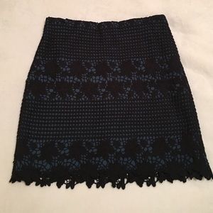 Loft skirt NWT black floral design over blue