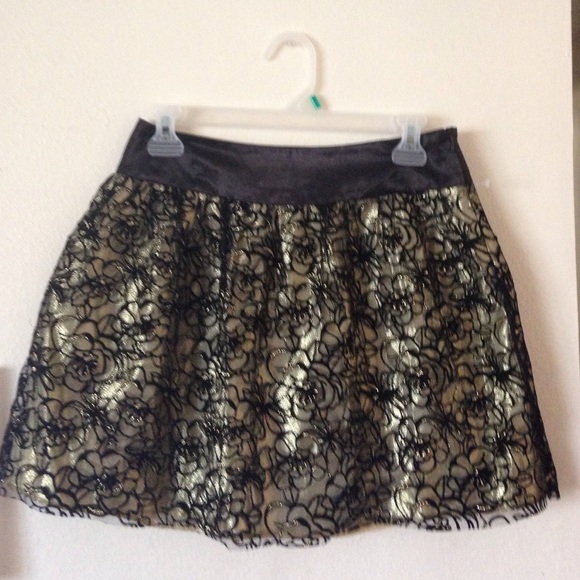 Medium size cute gold and black skirt