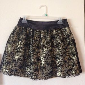Medium size cute gold and black skirt