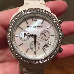 Authentic Michael Kors white watch.
