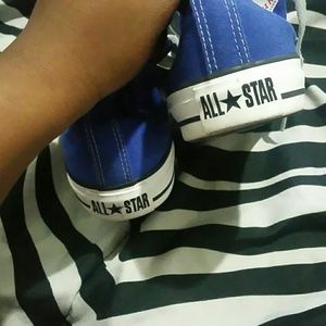 Royal blue high top converse