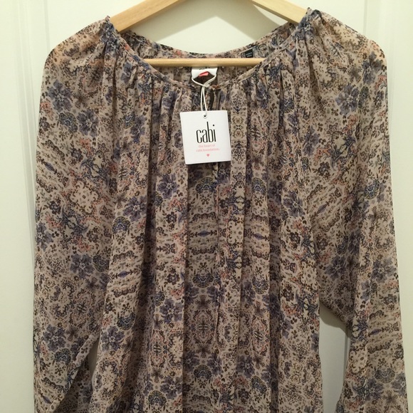 Cabi blouse, size Medium.  Goes with everything!