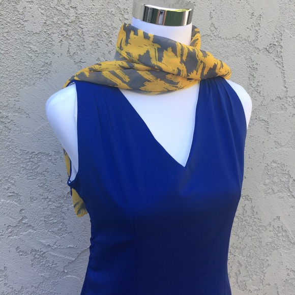 Blue dress with yellow scarf