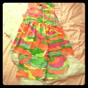 High low bright open back medium shirt.