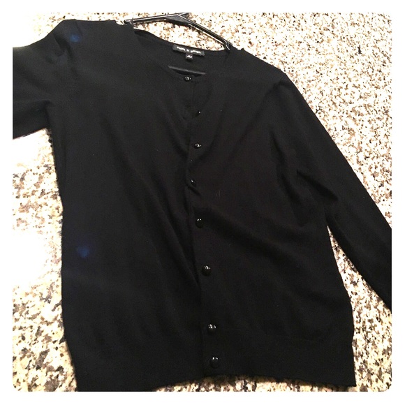 Very classy black sweater only wore a few times