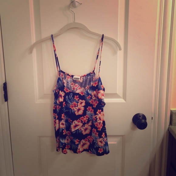 a PINK floral tank top.