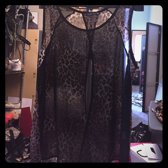 SOLD Sheer open back leopard print top