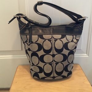 Gently used signature Coach print bucket bag