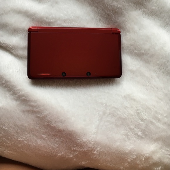 Nintendo 3DS with case, charger, and games