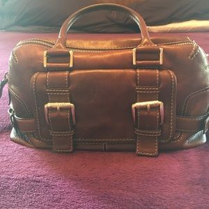 Brown leather Michael Kors handbag.