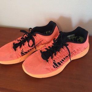 Bright coral/orange Nike Lunaracer 3