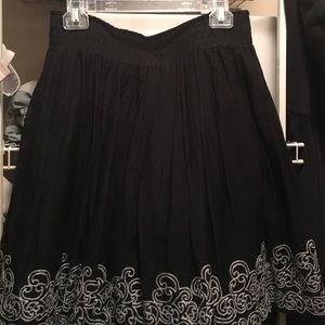 Black skirt with detailed hemline