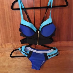 New 2 piece bathing suit Molly &Zoey boutique.