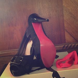 Black pony heels. Paris Hilton