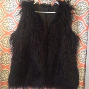 Black faux fur vest
