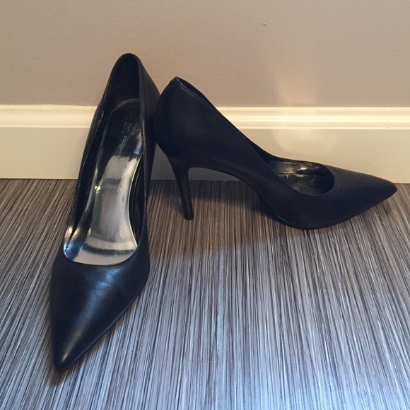 Black leather high heel shoes