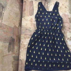 A pineapple print dress.