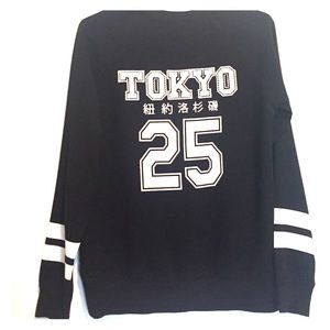 Black shirt with "Tokyo 25" on the back