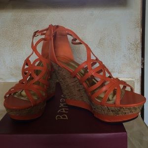 Orange strappy cork wedge shoes