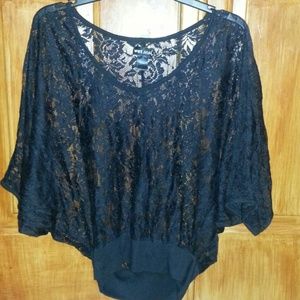 A black lace v-neck shirt