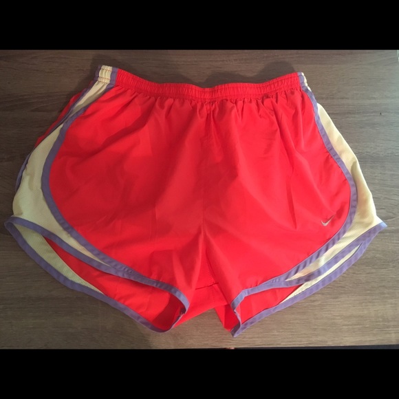 NIKE athletic shorts in hot coral. Size: large