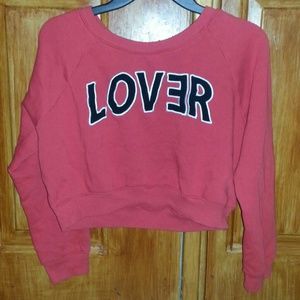 Red w/ black lettering outlined w/ white